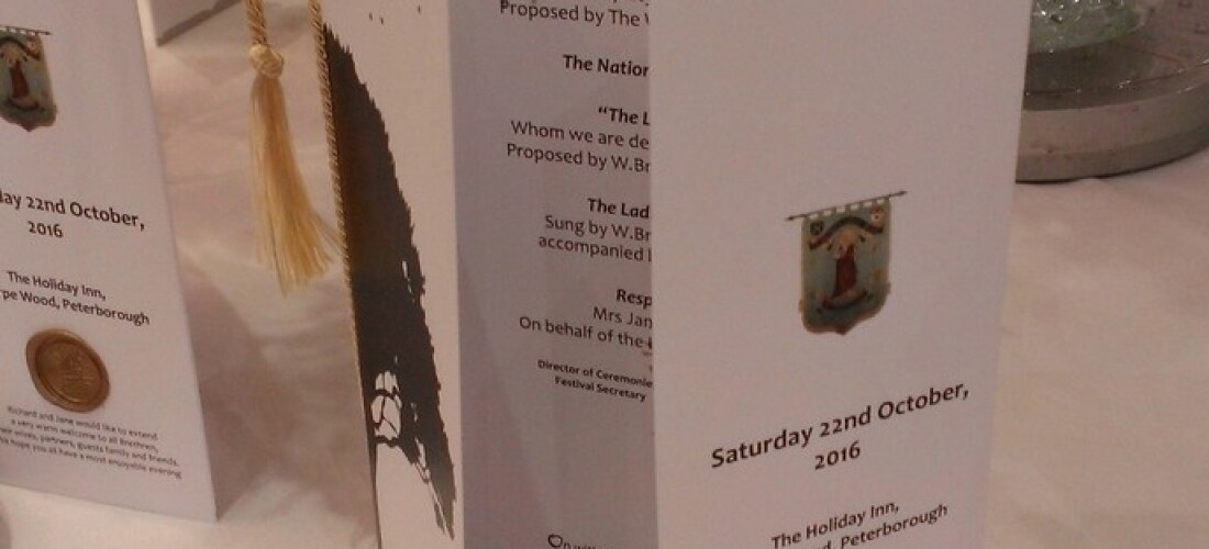 Ascot Graphics - bespoke printed event programmes with tasselled ribbon binding