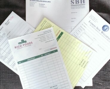 Ascot Graphics - selection of custom-printed NCR invoice pads for SBH, Rich Foods, and Loman Self Welding